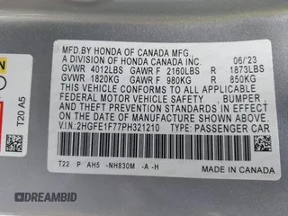 2023 Honda Civic EX with VIN 2HGFE1F77PH321210, listed as a IAAI auction lot 42379950 with Not provided miles and . Bid and sale history available at DreamBid. Image 9.