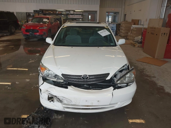 2004 Toyota Camry LE with VIN 4T1BE32K64U339432, listed as a IAAI auction lot 41622306 with 116,442 mi miles. Bid and sale history available at carsss.com. Image 12.