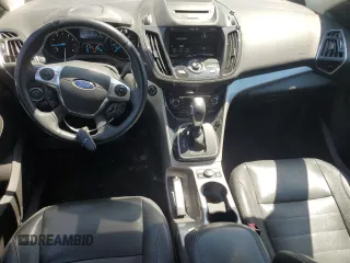 2013 Ford Escape SEL with VIN 1FMCU9HX1DUC79086, listed as a Copart auction lot 57312515 with 124,928 mi miles and Salvage title. Bid and sale history available at DreamBid. Image 8.