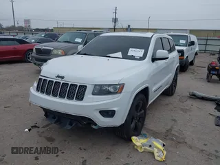 2015 Jeep Grand Cherokee Altitude with VIN 1C4RJEAG2FC901391, listed as a IAAI auction lot 41565763 with 220,685 mi miles. Bid and sale history available at carsss.com. Image 17.
