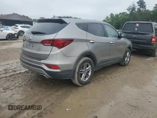 2017 Hyundai Santa Fe 2.4L z VIN 5NMZT3LBXHH038022, wystawiony jako Copart lot #51060545 z przebiegiem 63 790 mil mil oraz Szkoda całkowita • Salvage title. Historia ofert i sprzedaży dostępna na DreamBid. Obrazek 3.