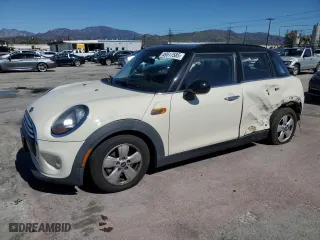 2015 MINI Cooper Hardtop 4 Door with VIN WMWXS5C54FT828800, listed as a Copart auction lot 49517585 with 75,692 mi miles and Salvage Title. Bid and sale history available at carsss.com. Image 1.