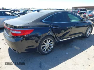 2013 Hyundai Azera with VIN KMHFH4JG4DA287957, listed as a IAAI auction lot 41763771 with 165,764 mi miles. Bid and sale history available at carsss.com. Image 4.