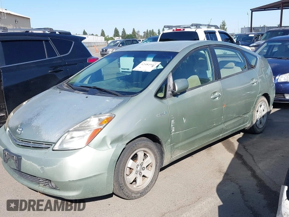 2007 Toyota Prius z VIN JTDKB20U973221624, wystawiony jako IAAI lot #42484947 z przebiegiem 257 311 mil mil oraz . Historia ofert i sprzedaży dostępna na DreamBid. Obrazek 6.