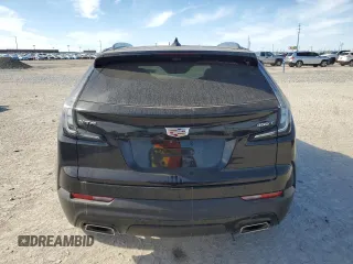 2023 Cadillac XT4 FWD Sport with VIN 1GYFZER47PF107311, listed as a Copart auction lot 87583565 with 26,585 mi miles and Salvage title. Bid and sale history available at DreamBid. Image 6.