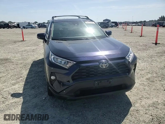 2020 Toyota RAV4 XLE with VIN 2T3W1RFV2LW074325, listed as a Copart auction lot 58693665 with 34,830 mi miles and Salvage title. Bid and sale history available at DreamBid. Image 14.