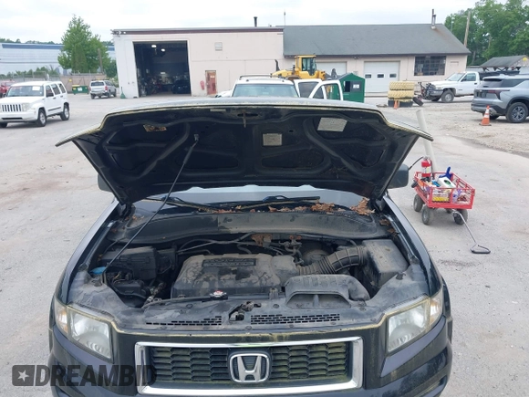 2007 Honda Ridgeline RTX z VIN 2HJYK16317H545839, wystawiony jako IAAI lot #42446190 z przebiegiem 183 600 mil mil oraz . Historia ofert i sprzedaży dostępna na DreamBid. Obrazek 10.
