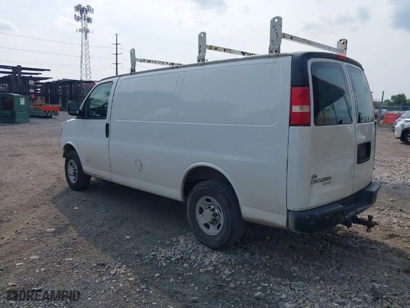 2012 Chevrolet Express Cargo Van with VIN 1GCWGFCA7C1103864, listed as a IAAI auction lot 39946545 with 167,720 mi miles. Bid and sale history available at carsss.com. Image 3.