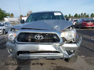 2014 Toyota Tacoma PreRunner with VIN 3TMJU4GN0EM163253, listed as a IAAI auction lot 41559780 with 155,883 mi miles. Bid and sale history available at carsss.com. Image 12.