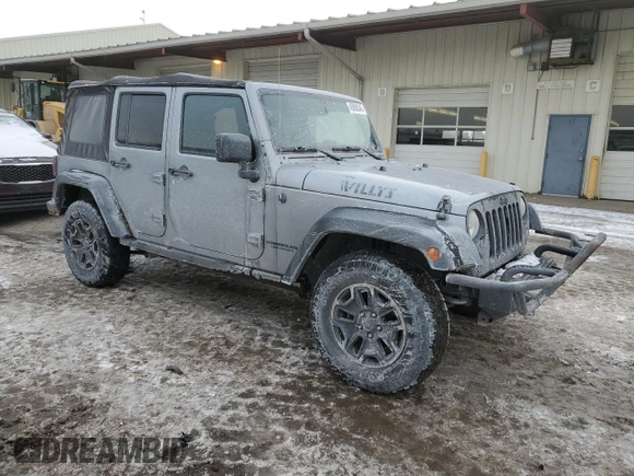 2015 Jeep Wrangler Unlimited Willys Wheeler with VIN 1C4BJWDG9FL516493, listed as a Copart auction lot 45098345 with 152,009 mi miles and Salvage Title. Bid and sale history available at DreamBid. Image 4.