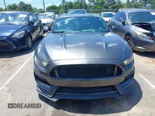 2015 Ford Mustang EcoBoost z VIN 1FA6P8TH5F5351476, wystawiony jako IAAI lot #42157688 z przebiegiem 134 131 mil mil oraz . Historia ofert i sprzedaży dostępna na DreamBid. Obrazek 13.