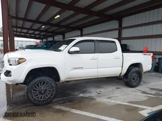 2016 Toyota Tacoma SR with VIN 5TFCZ5AN3GX039919, listed as a IAAI auction lot 41607382 with 107,703 mi miles. Bid and sale history available at carsss.com. Image 14.