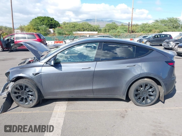 2023 Tesla Model Y Long Range z VIN 7SAYGAEE4PF945847, wystawiony jako IAAI lot #41071924 z przebiegiem 33 454 mil mil oraz . Historia ofert i sprzedaży dostępna na DreamBid. Obrazek 15.