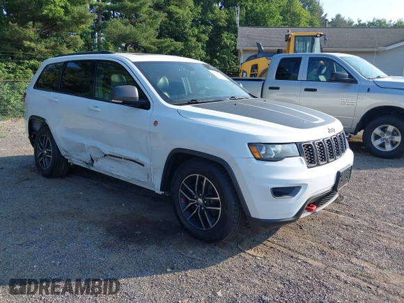 2017 Jeep Grand Cherokee Trailhawk with VIN 1C4RJFLG2HC670868, listed as a IAAI auction lot 42711041 with 129,465 mi miles and . Bid and sale history available at DreamBid. Image 1.