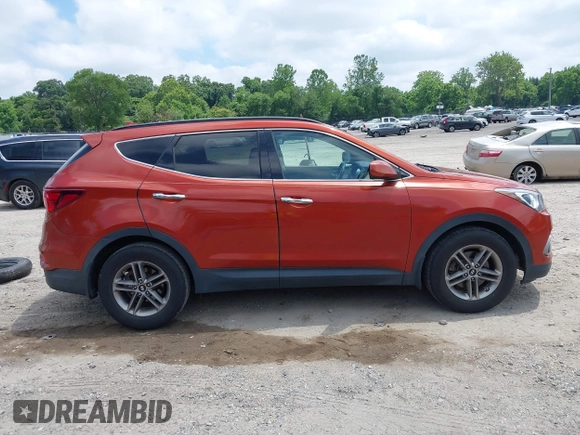 2017 Hyundai Santa Fe 2.4L z VIN 5XYZUDLB1HG463416, wystawiony jako IAAI lot #42546637 z przebiegiem 81 963 mil mil oraz . Historia ofert i sprzedaży dostępna na DreamBid. Obrazek 13.