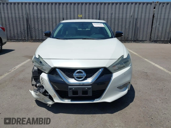 2016 Nissan Maxima SV with VIN 1N4AA6AP6GC903638, listed as a IAAI auction lot 42180421 with 124,586 mi miles and . Bid and sale history available at DreamBid. Image 12.