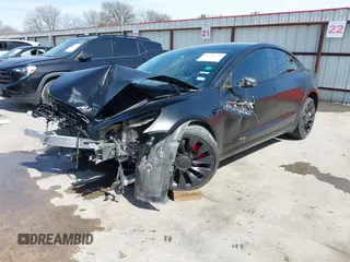 2022 Tesla Model 3 Performance with VIN 5YJ3E1EC6NF104475, listed as a IAAI auction lot 41734724 with 31,717 mi miles and . Bid and sale history available at carsss.com. Image 2.