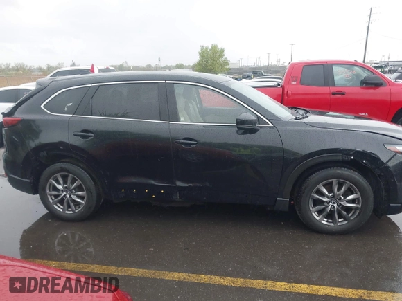 2016 Mazda CX-9 Touring with VIN JM3TCBCY5G0101490, listed as a IAAI auction lot 42062846 with 85,352 mi miles and . Bid and sale history available at DreamBid. Image 13.