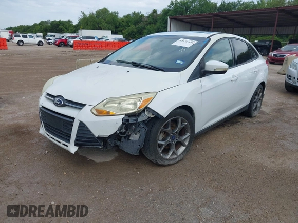 2013 Ford Focus SE with VIN 1FADP3F24DL302263, listed as a IAAI auction lot 42672666 with 207,805 mi miles and . Bid and sale history available at DreamBid. Image 2.