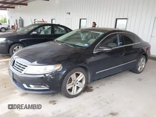 2013 Volkswagen CC Sport with VIN WVWBP7AN1DE506856, listed as a IAAI auction lot 42111392 with 172,706 mi miles. Bid and sale history available at carsss.com. Image 2.