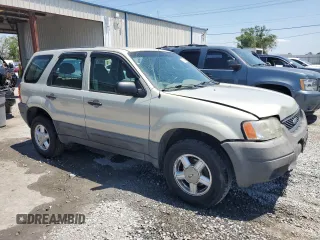 2004 Ford Escape with VIN 1FMCU02184KB21677, listed as a Copart auction lot 58401445 with 102,508 mi miles and Salvage title. Bid and sale history available at DreamBid. Image 4.
