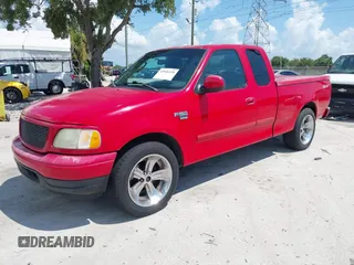 2002 Ford F-150 XL with VIN 1FTRX17W32NB15930, listed as a IAAI auction lot 42846328 with Not provided miles and . Bid and sale history available at DreamBid. Image 2.