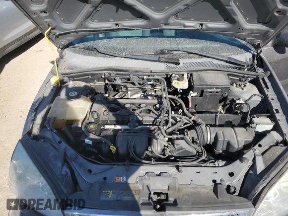 2007 Ford Focus S with VIN 1FAHP34N27W151263, listed as a Copart auction lot 42933324 with 128,598 mi miles and Salvage Title. Bid and sale history available at carsss.com. Image 11.