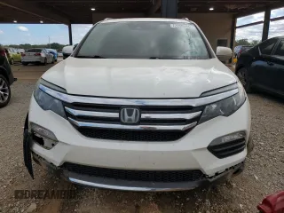 2017 Honda Pilot Touring z VIN 5FNYF6H92HB067140, wystawiony jako Copart lot #72200584 z przebiegiem 127 856 mil mil oraz Szkoda całkowita • Salvage title. Historia ofert i sprzedaży dostępna na DreamBid. Obrazek 5.