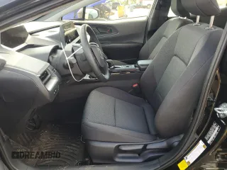 2024 Toyota Prius LE with VIN JTDACAAU1R3047729, listed as a Copart auction lot 55657455 with 2,092 mi miles and Salvage Title. Bid and sale history available at DreamBid. Image 7.