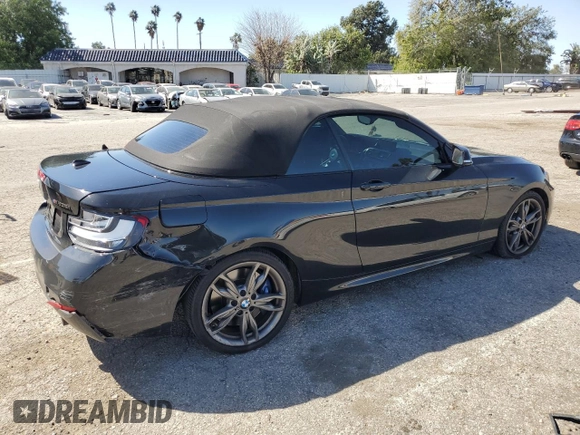 2015 BMW 2 Series M235i with VIN WBA1M1C56FV393730, listed as a Copart auction lot 45348734 with 59,231 mi miles and Salvage title. Bid and sale history available at DreamBid. Image 3.