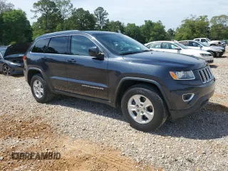 2014 Jeep Grand Cherokee Laredo with VIN 1C4RJEAGXEC160132, listed as a Copart auction lot 55599615 with 127,541 mi miles and Clean Title. Bid and sale history available at DreamBid. Image 4.