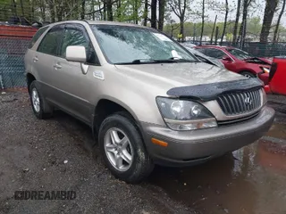1999 Lexus RX 300 Luxury SUV with VIN JT6GF10U8X0020178, listed as a IAAI auction lot 42023372 with 268,817 mi miles. Bid and sale history available at carsss.com. Image 1.