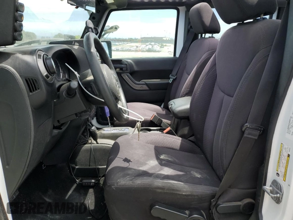 2013 Jeep Wrangler Unlimited Sport with VIN 1C4BJWDG8DL639781, listed as a Copart auction lot 63620025 with 84,720 mi miles and Salvage title. Bid and sale history available at DreamBid. Image 7.