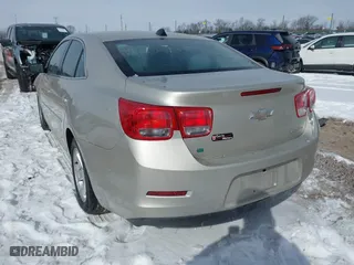 2014 Chevrolet Malibu LS with VIN 1G11B5SL1EF219694, listed as a IAAI auction lot 41615933 with 121,349 mi miles. Bid and sale history available at carsss.com. Image 3.