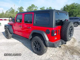 2020 Jeep Wrangler Unlimited Willys z VIN 1C4HJXDM1LW290451, wystawiony jako IAAI lot #42586990 z przebiegiem 64 163 mil mil oraz . Historia ofert i sprzedaży dostępna na DreamBid. Obrazek 3.