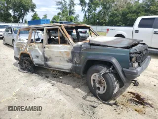1994 Jeep Cherokee Sport with VIN 1J4FT68S1RL216777, listed as a Copart auction lot 73310134 with 0 mi miles and Non Repairable. Bid and sale history available at carsss.com. Image 4.