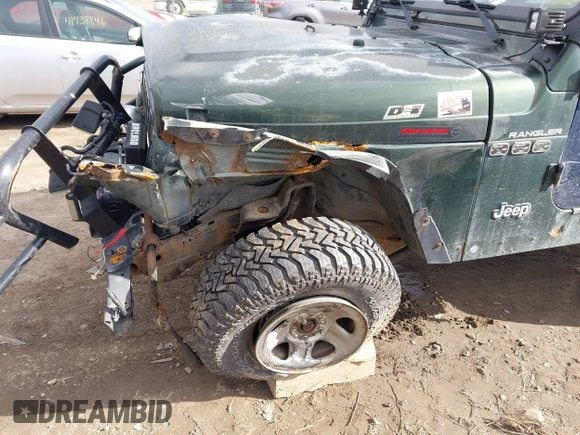 1997 Jeep Wrangler SE with VIN 1J4FY29PXVP406939, listed as a IAAI auction lot 41612380 with 248,314 mi miles. Bid and sale history available at carsss.com. Image 18.