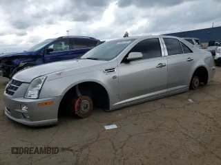 2008 Cadillac STS AWD z VIN 1G6DD67V180196748, wystawiony jako Copart lot #59059165 z przebiegiem Nie podano mil oraz Czysty tytuł • Clean title. Historia ofert i sprzedaży dostępna na DreamBid. Obrazek 1.