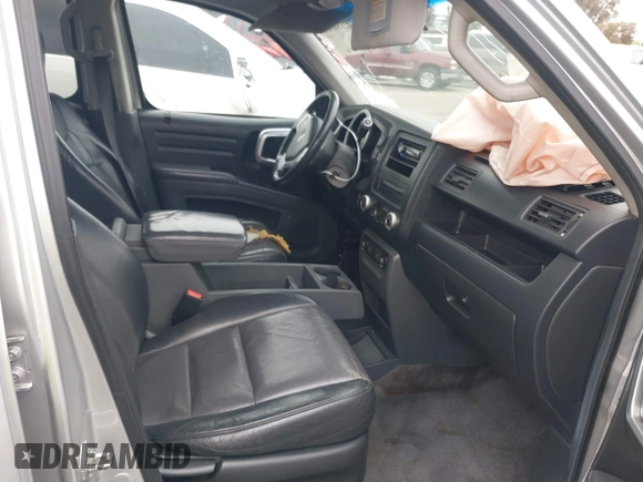 2006 Honda Ridgeline RTL with VIN 2HJYK16566H532598, listed as a IAAI auction lot 42184828 with 91,817 mi miles and . Bid and sale history available at DreamBid. Image 5.