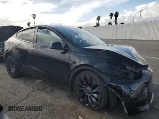 2022 Tesla Model Y Performance with VIN 7SAYGDEF9NF455508, listed as a Copart auction lot 51517205 with Not provided miles and Salvage title. Bid and sale history available at DreamBid. Image 4.