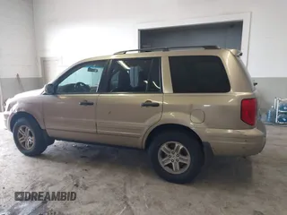 2005 Honda Pilot EX-L with VIN 5FNYF18565B019345, listed as a IAAI auction lot 41641423 with 282,099 mi miles. Bid and sale history available at carsss.com. Image 14.
