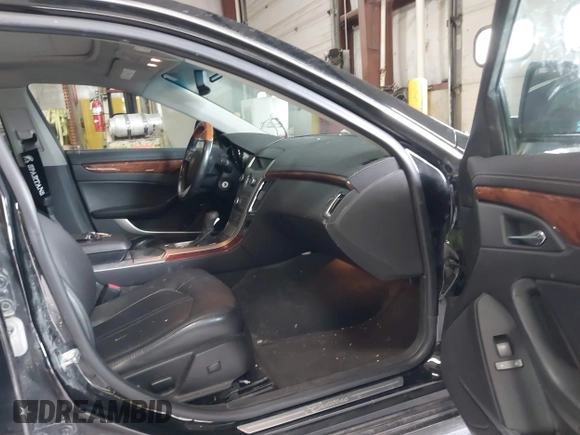 2011 Cadillac CTS Luxury with VIN 1G6DG5EYXB0145058, listed as a IAAI auction lot 41973156 with 143,246 mi miles and . Bid and sale history available at carsss.com. Image 5.