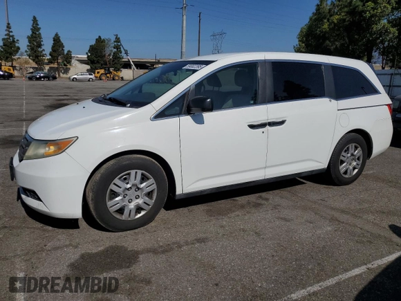 2011 Honda Odyssey LX z VIN 5FNRL5H2XBB054864, wystawiony jako Copart lot #59002395 z przebiegiem 146 987 mil mil oraz Czysty tytuł • Clean title. Historia ofert i sprzedaży dostępna na DreamBid. Obrazek 1.