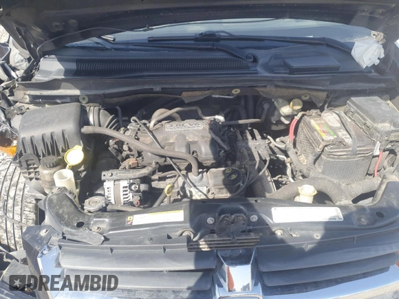 2010 Dodge Grand Caravan with VIN 2D4RN5D1XAR323622, listed as a Copart auction lot 52638465 with 158,491 mi miles and Salvage Title. Bid and sale history available at DreamBid. Image 12.