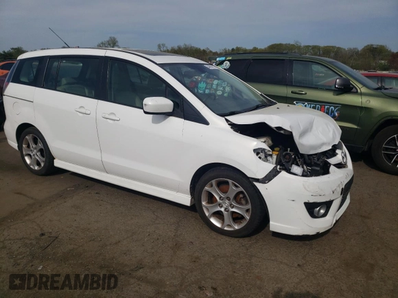 2010 Mazda 5 Sport with VIN JM1CR2WL6A0362562, listed as a Copart auction lot 54691615 with 102,429 mi miles and Salvage Title. Bid and sale history available at DreamBid. Image 4.