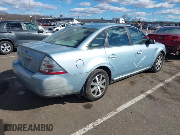 2008 Ford Taurus SEL with VIN 1FAHP27WX8G157077, listed as a IAAI auction lot 41499882 with 113,039 mi miles. Bid and sale history available at carsss.com. Image 4.