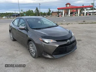 2019 Toyota Corolla L z VIN 2T1BURHE5KC220051, wystawiony jako Copart lot #61879415 z przebiegiem 196 200 mil mil oraz Czysty tytuł • Clean title. Historia ofert i sprzedaży dostępna na DreamBid. Obrazek 1.