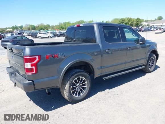 2018 Ford F-150 XL with VIN 1FTEW1EG2JFE55513, listed as a IAAI auction lot 41530354 with 132,617 mi miles. Bid and sale history available at carsss.com. Image 4.