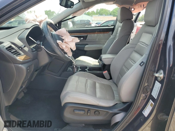 2018 Honda CR-V Touring with VIN 2HKRW2H9XJH605264, listed as a Copart auction lot 61500315 with 106,616 mi miles and Salvage title. Bid and sale history available at DreamBid. Image 7.