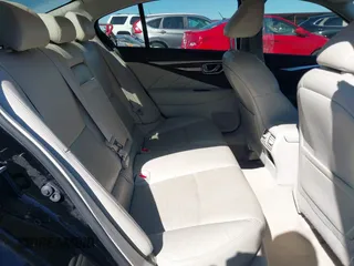 2014 Infiniti Q50 Premium z VIN JN1BV7AP4EM680924, wystawiony jako IAAI lot #41820183 z przebiegiem 125 455 mil mil oraz . Historia ofert i sprzedaży dostępna na DreamBid. Obrazek 8.
